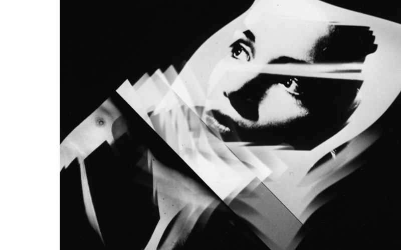 Cover of the book "Ed Sommer. Planetary Alliance": Black-and-white photo of a woman's face floats in black space